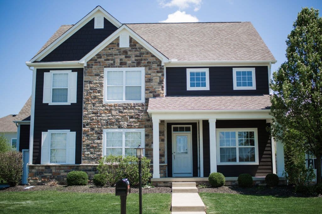 modern-exterior-house-painting-upgrade-dark-gray-siding-white-trim-after-1-1024x683.jpg