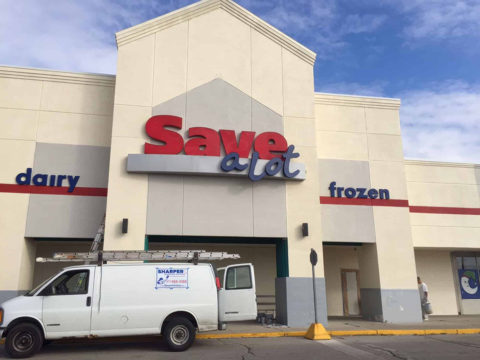 painting the exterior of Save a Lot commercial space