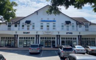 commercial property lot with parked cars - electrostatic paint