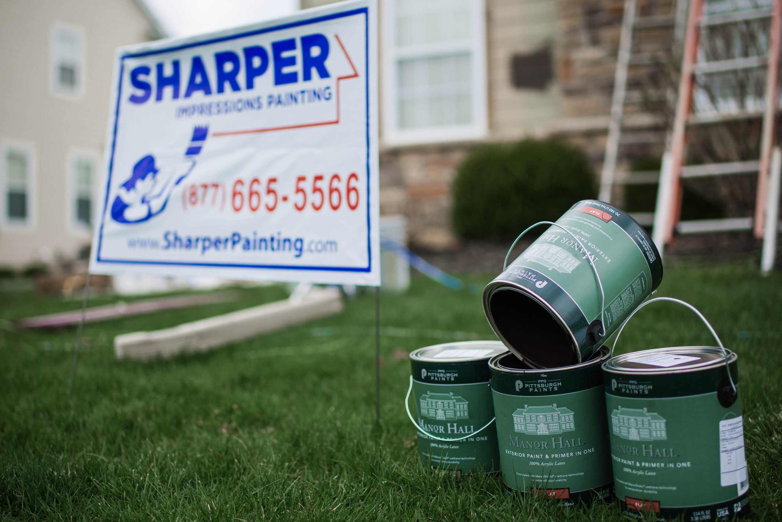 Four paint cans after a painting project